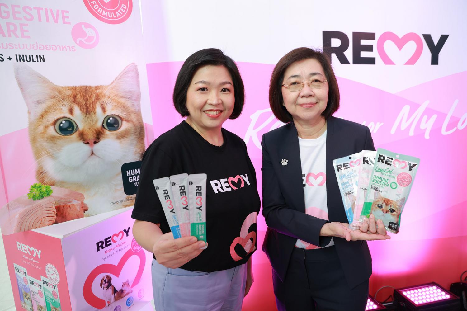 Ms Sudatip, left, and Dr Kitika promote 'Remy' premium pet food brand at its official launch.