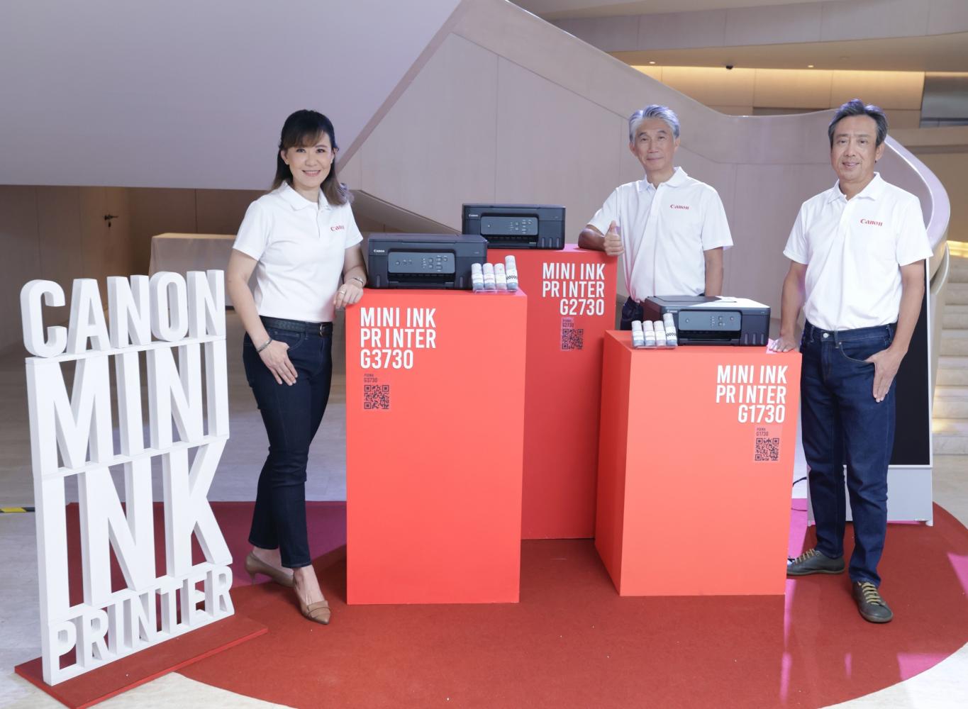 Pictured from left are Ms Netnarin, Mr Katagiri and Hiroshi Yokota, president and chief executive, Canon Marketing (Thailand). The trio introduced the Canon 'Mini Ink' printer at a press conference on Thursday.