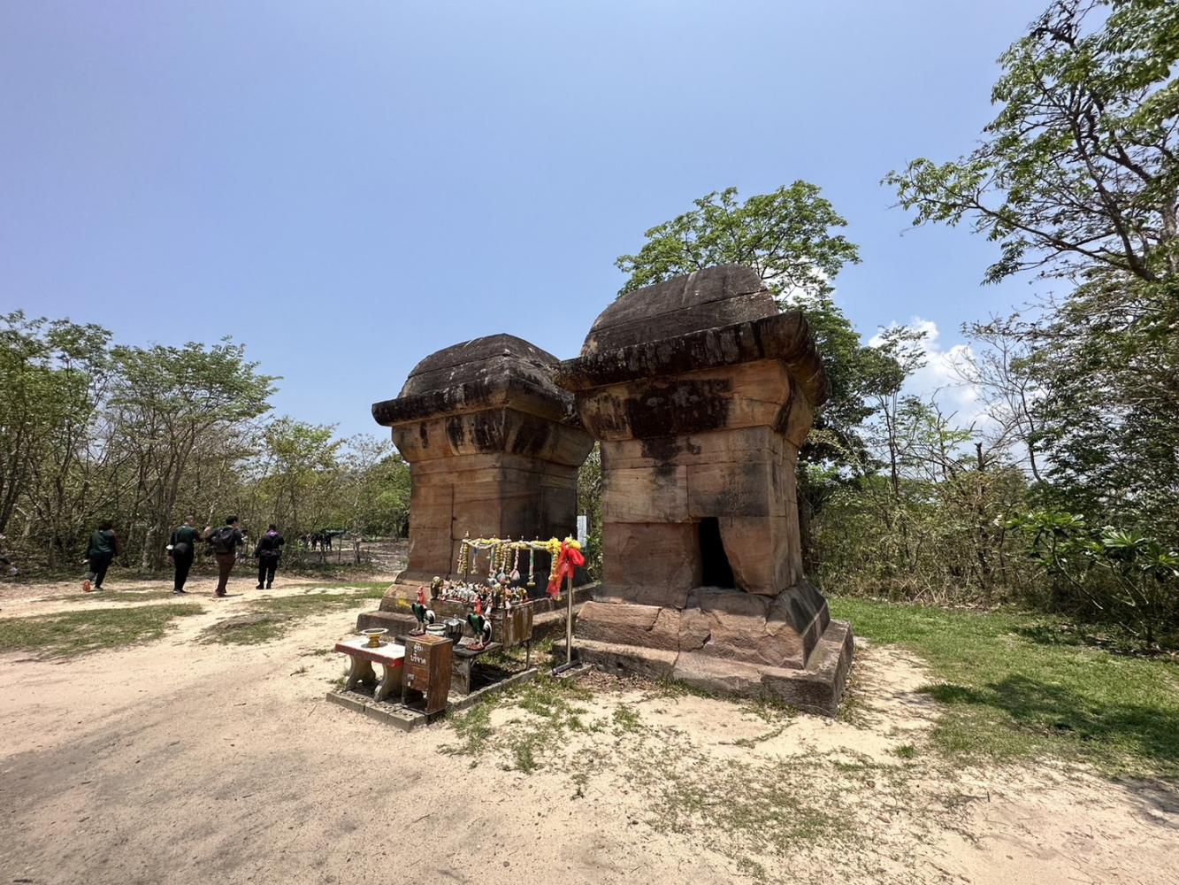 Tourists pass twin stupas in the Khao Phra Wihan National Park in Si Sa Ket province. The sandstone structures and Cambodia's Phrea Vihear Temple were built in the same period. WASSANA NANUAM