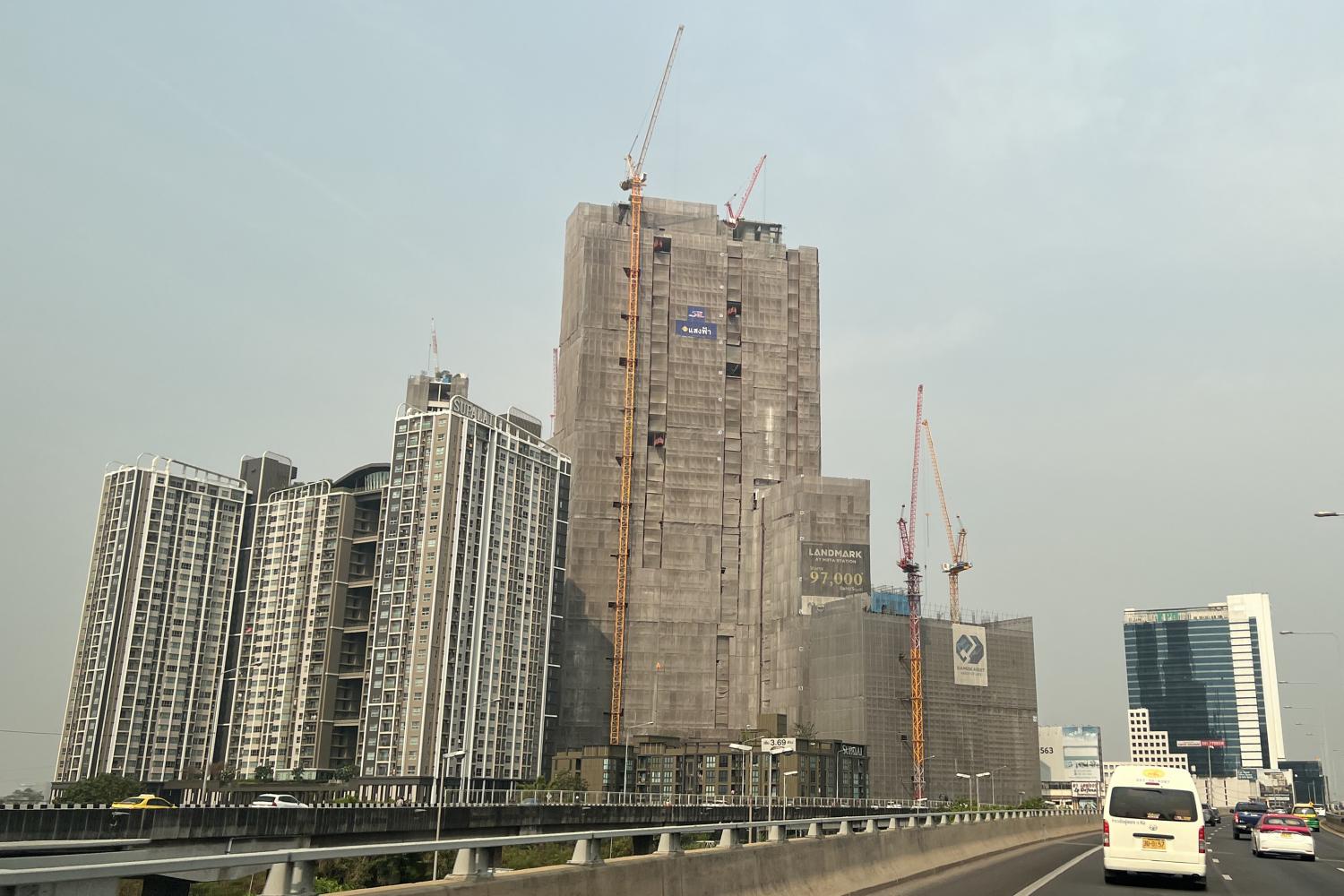 Condominiums under construction along Rama 9 Road in Bangkok. Pattanapong Hirunard