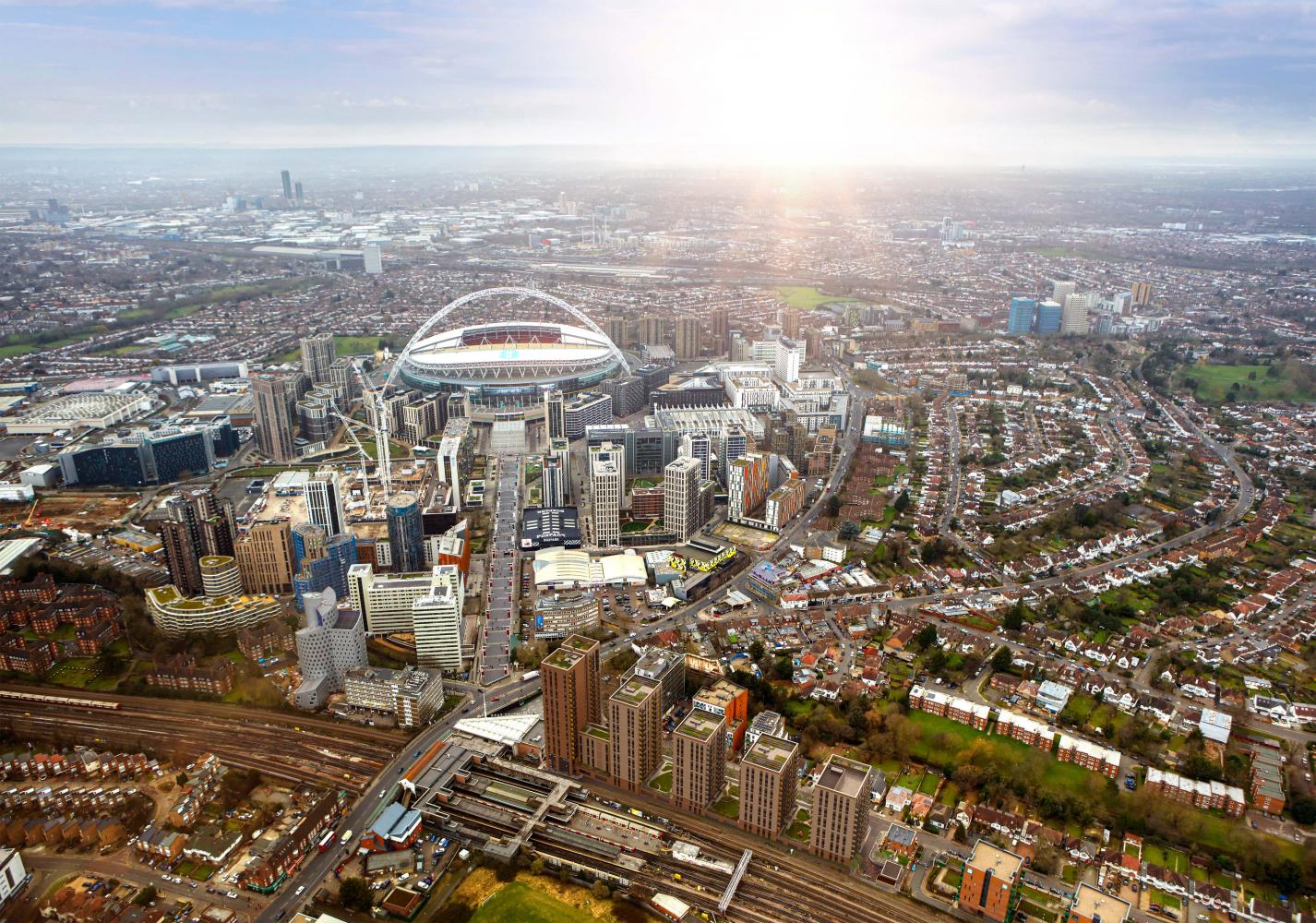 Wembley Stadium and its surrounding neighbourhoods are captured in an artist's rendition of the five brown towers of Wembley Park Gardens.