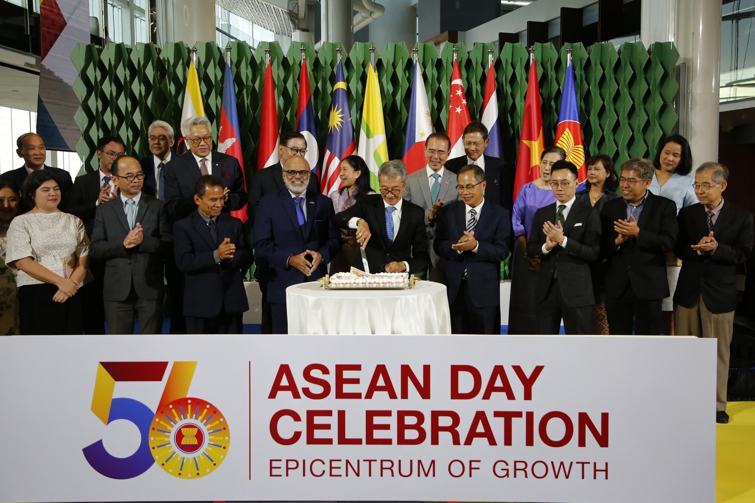 Rachmat Budiman, Indonesia's ambassador to Thailand, cuts a cake to mark Asean's 56th anniversary, at the C Asean Forum 2023 on Tuesday. Indonesia is Asean's chairman this year. Distinguished guests, including diplomats and senior government officials, attended the event. (Photo: Wichan Charoenkiatpakul)