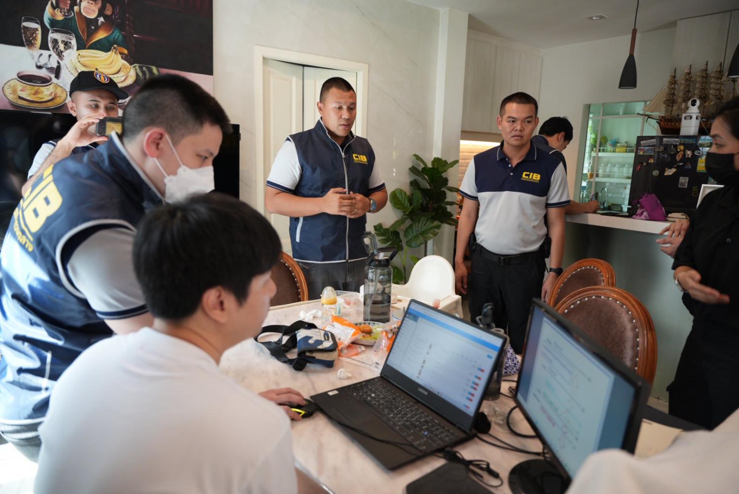 To catch a predator: Police search the house of a man accused of offering sexual services online involving minors. He is among four suspects arrested in Bangkok and Samut Prakan.