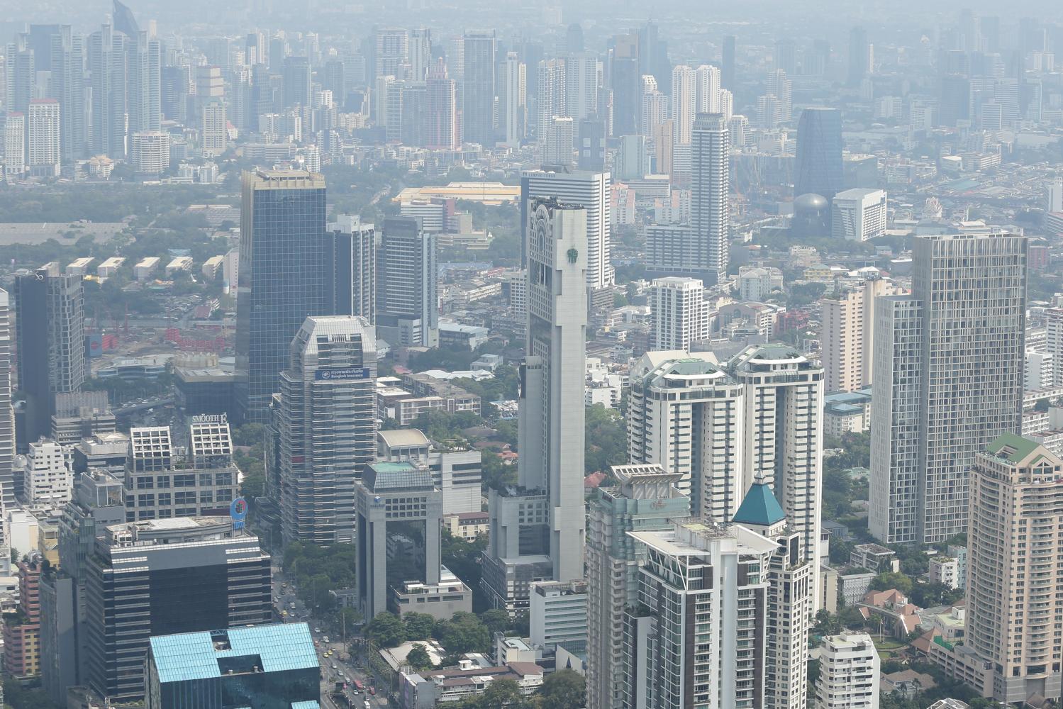 An aerial view of property and buildings in Bangkok. The prime minister on Monday ordered the revenue department to review the new land and building tax, as well as inheritance tax. (Bangkok Post file photo)