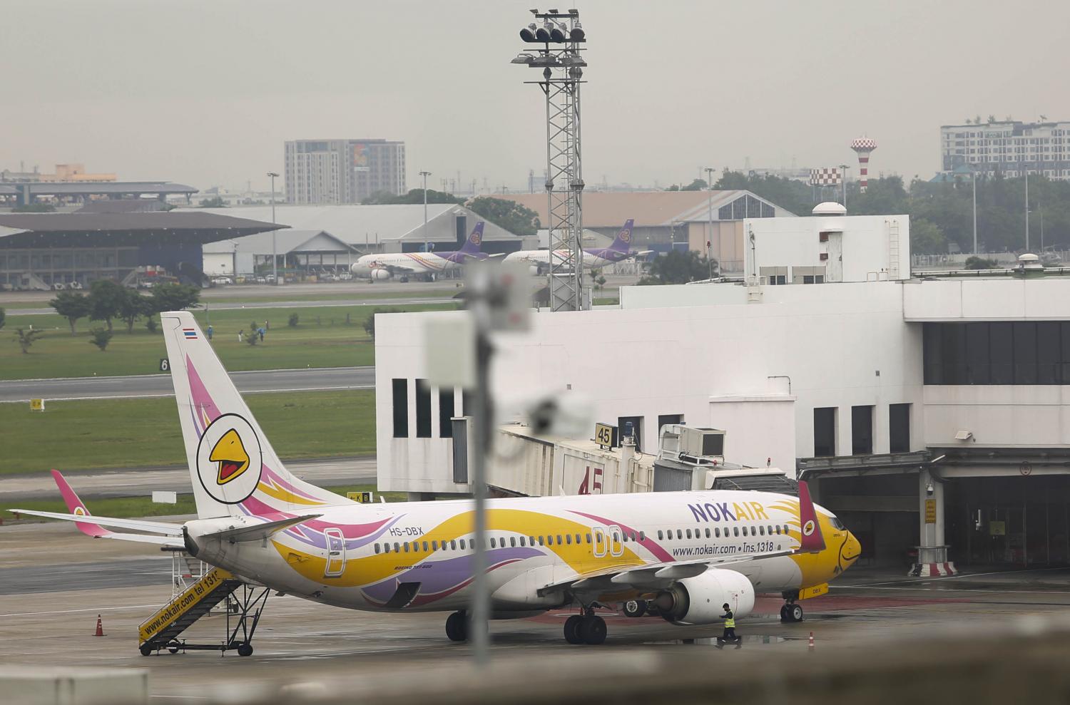 A passenger aircraft operated by Nok Air on the tarmac at Don Mueang International Airport. (Photo: Pattarapong Chatpattarasill)