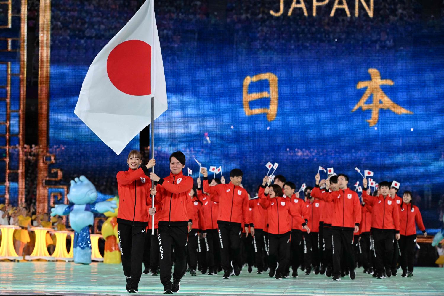 Japan's athletes and officials take part in the opening ceremony of the Hangzhou Asian Games. (Photo: AFP)