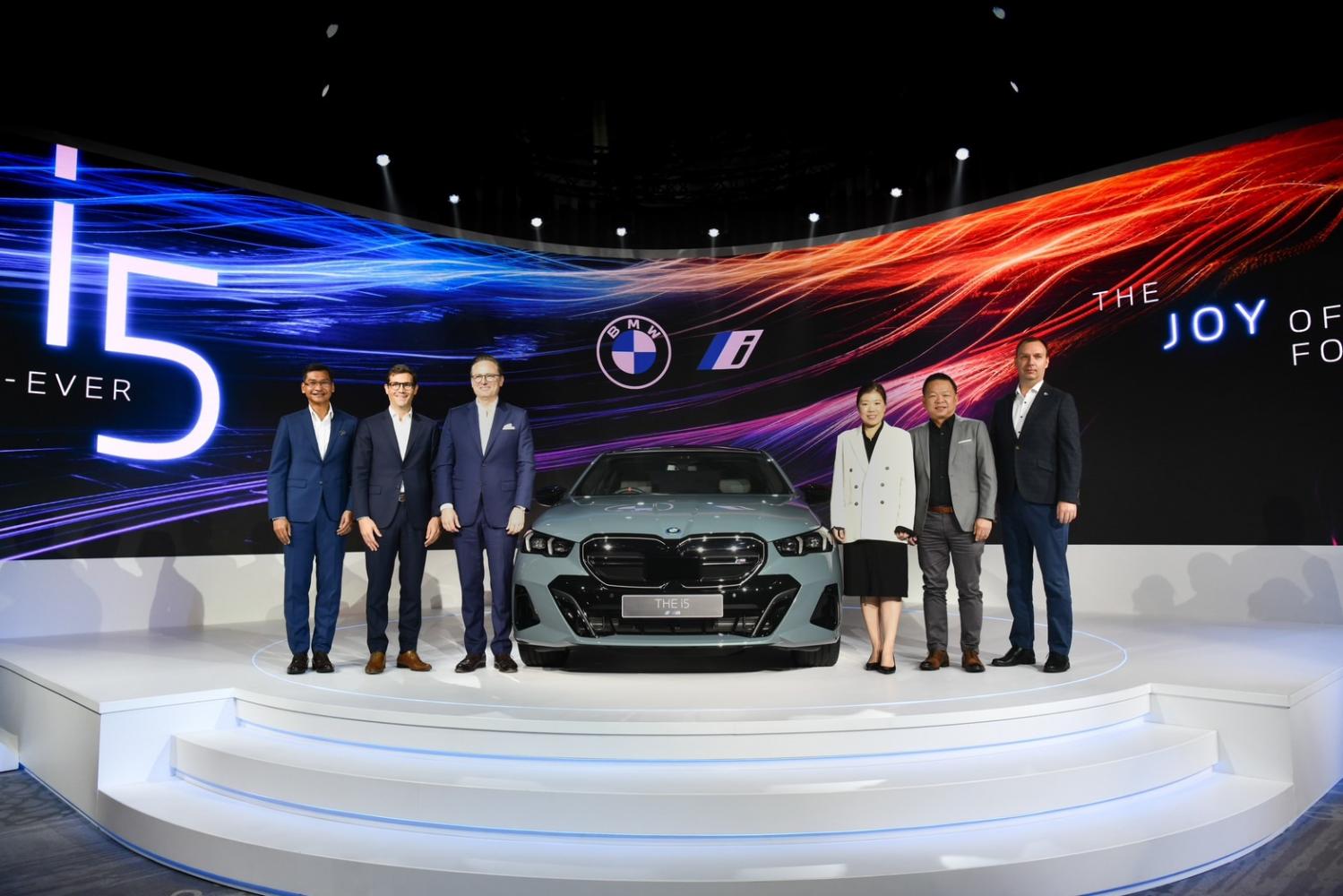 Mr Baraka, centre left, is pictured at the launch of BMW's i5 model. BMW Group Thailand is considering building an EV assembly factory in Thailand.