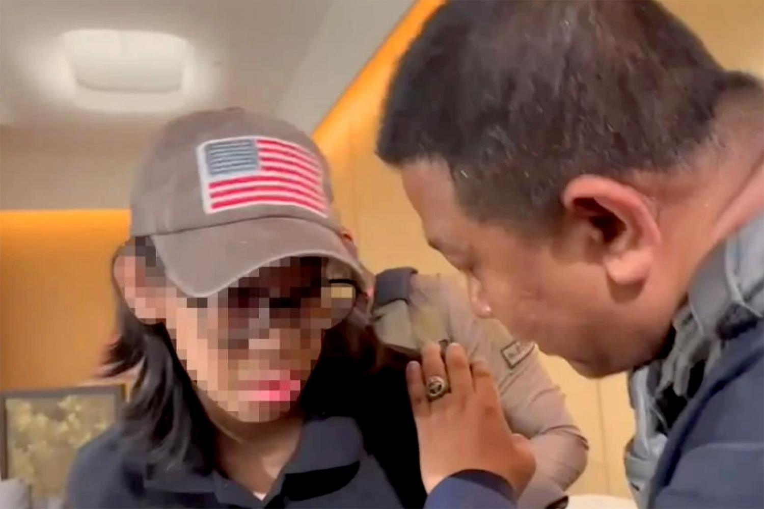 A boy was consoled by police after being arrested for a shooting rampage at Siam Paragon on Oct 3. (Photos by POLICE PHOTO and Nutthawat Wichieanbut)