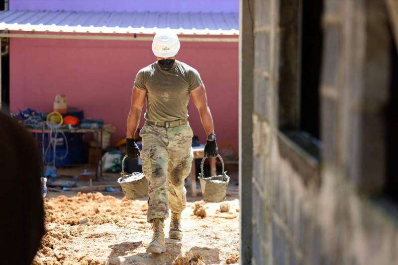 This file photo, dated Feb 19, 2022, shows a US soldier taking part in the Cobra Gold 2022 joint military exercise by helping in the construction of schools in Rayong province. (Photo: Royal Thai Army)