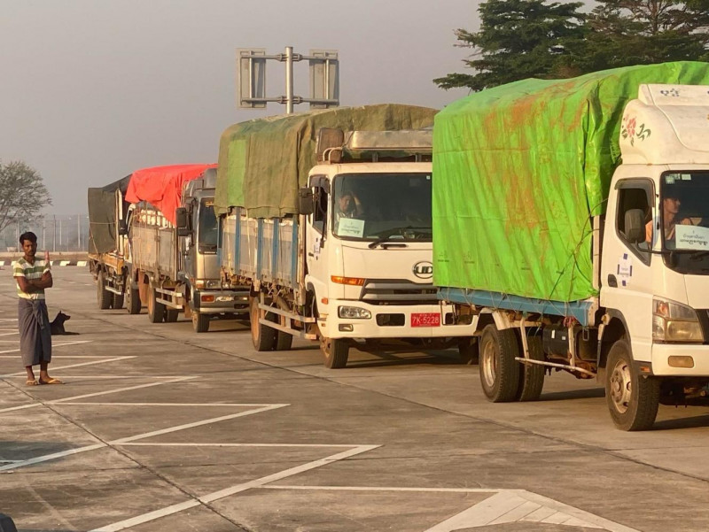 Trucks loaded with relief items head from Mae Sot district in Tak province to a village on Myanmar's border on March 25.  TransborderNews