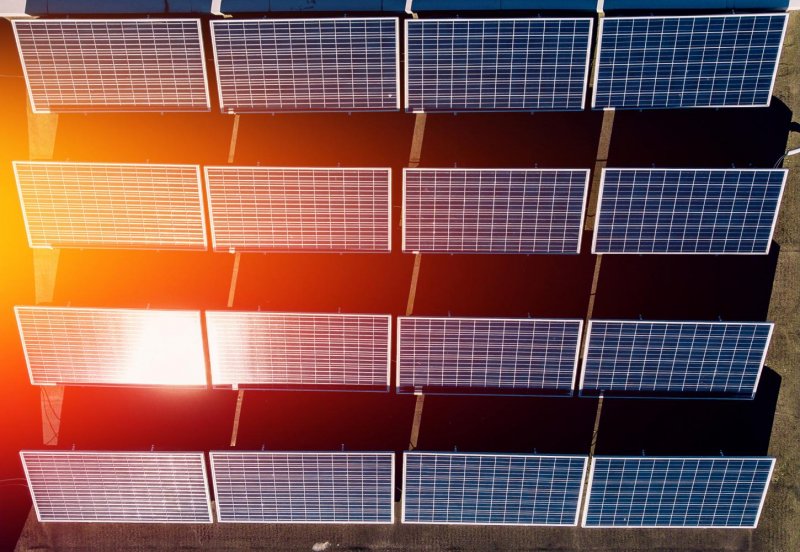 An aerial view of solar panels generating electricity.