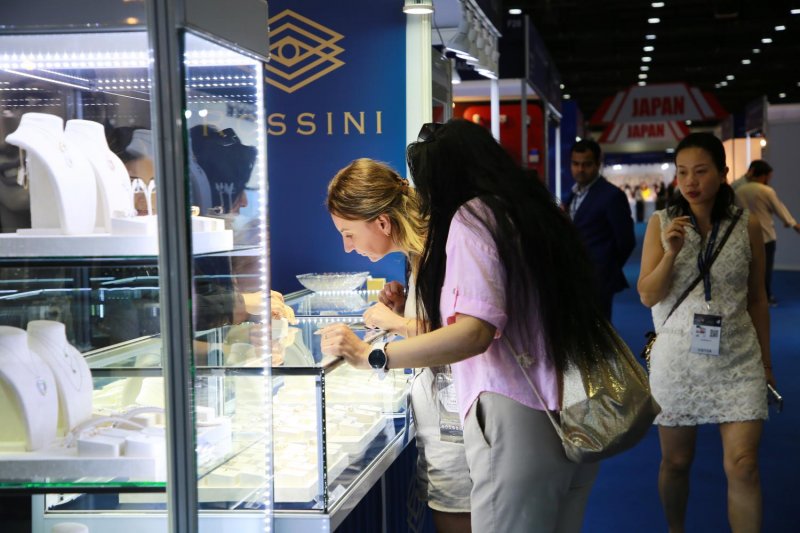 Foreign visitors examine jewellery items on display at a fair in Bangkok. Gems and jewellery are among the top Thai exports to the EU.