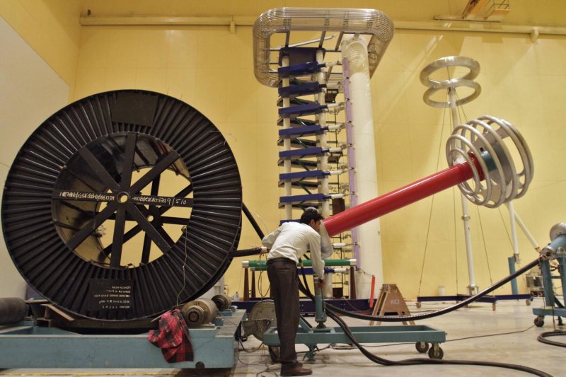 An employee works inside the power-cable-testing laboratory for insulation at Kei Industries, in this Aug 6, 2012 file photo. (Photo: Reuters)