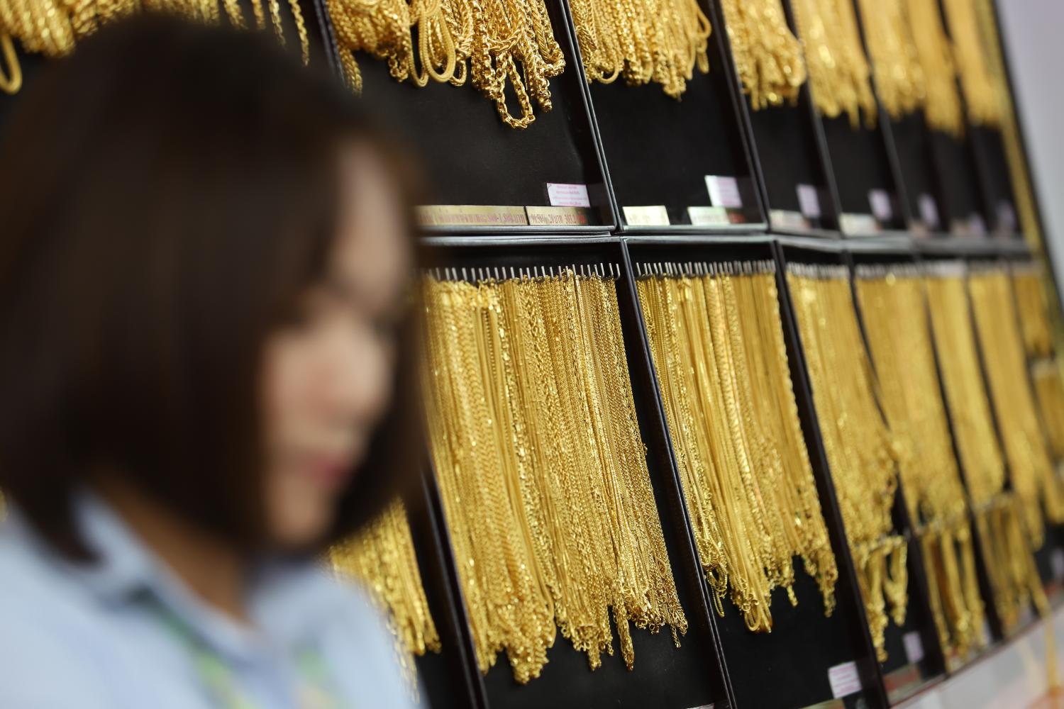 Gold and oil prices are expected to continue to rise this year as escalating geopolitical tensions fuel market volatility. Somchai Poomlard