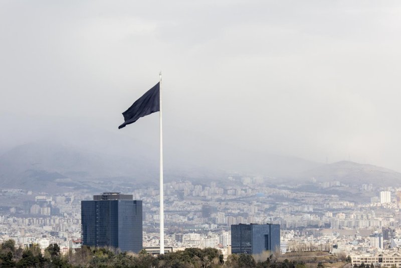 A black flag flies over Tehran, Iran, after the killing of Iran's Supreme Leader Ayatollah Ali Khamenei. (Photo: The New York Times)