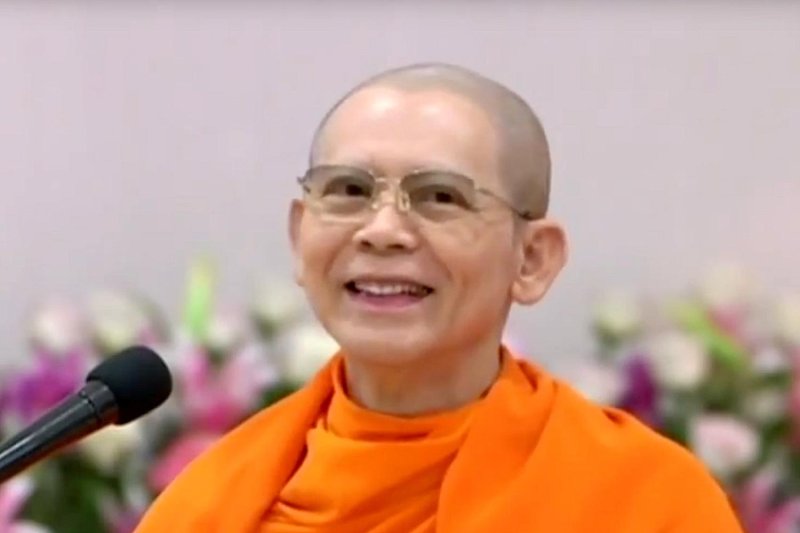 Phra Dhammajayo, the former abbot of Wat Phra Dhammakaya, has not been seen publicly since he was charged by the Department of Special Investigation in 2016. (TV SCREEN CAPTURE)