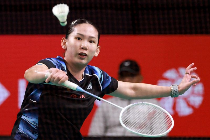 Perfect run: Pornpawee Chochuwong plays a shot against Nozomi Okuhara. AFP