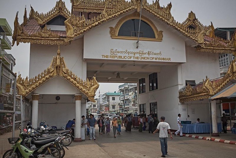 People travel through the Myawaddy border checkpoint. Mrs Arada says the reopening of the checkpoint is a positive signal for the border trade as it is a major gateway to Myanmar's key economic areas.