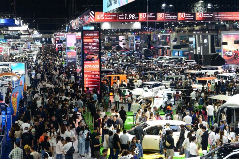 Crowds throng Impact Challenger Hall in Nonthaburi to explore the latest automotive models, including EVs, at last year's Motor Expo. As EVs gain traction, concerns are mounting over their impact on the local auto industry.