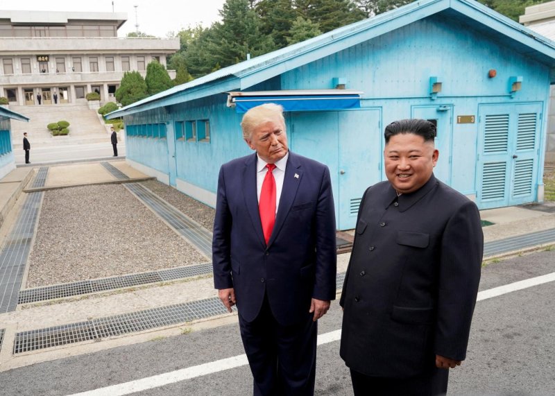 US President Donald Trump meets North Korean leader Kim Jong-un at the demilitarised zone separating the two Koreas, in Panmunjom on 30 June 2019. (Photo: Reuters)