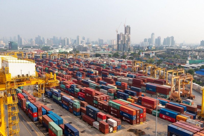 Containers stacked at a Thai port. A think tank forecasts exports in US dollar terms to grow by 17.8% in 2026, up from its previous projection of 8.8% in May.