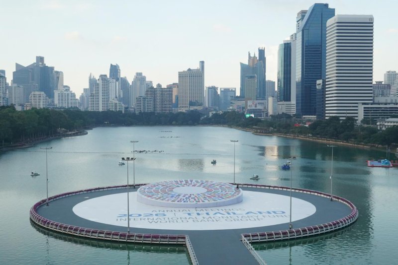 A display for the 2026 Annual Meetings of the International Monetary Fund and World Bank Group, which run from Oct 12-18, sits on a platform above the lake at the Queen Sirikit National Convention Center (QSNCC) in Bangkok. Wisuttipong Rodpai