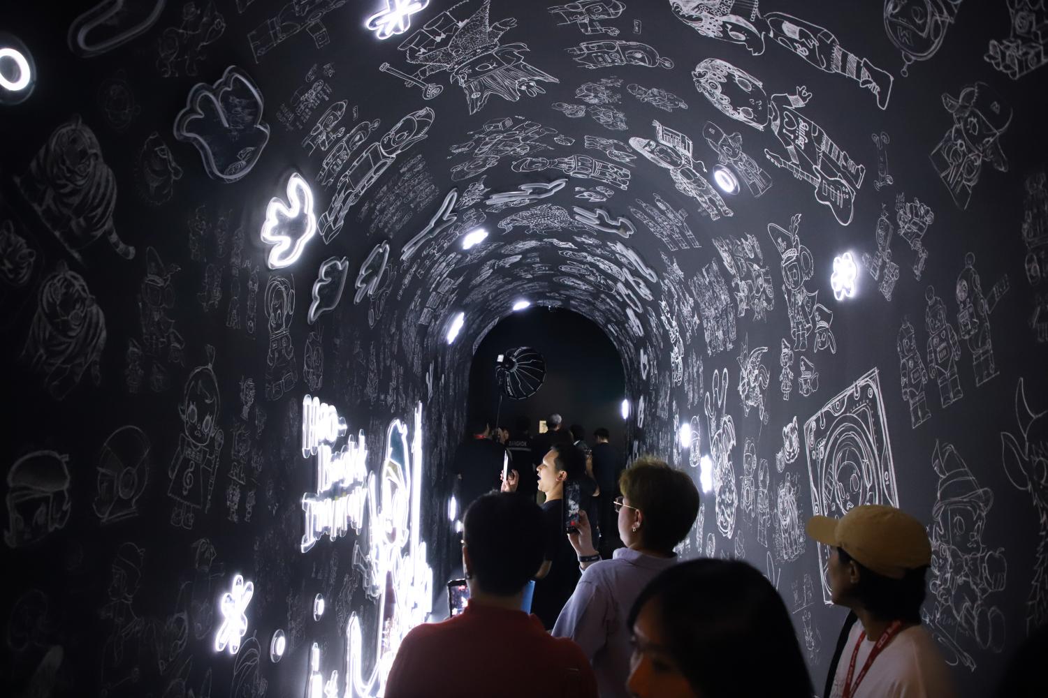 Walking through the black tunnel.