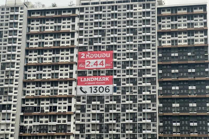 Banners advertise condominium units for sale in Bangkok.  Pattanapong Hirunard