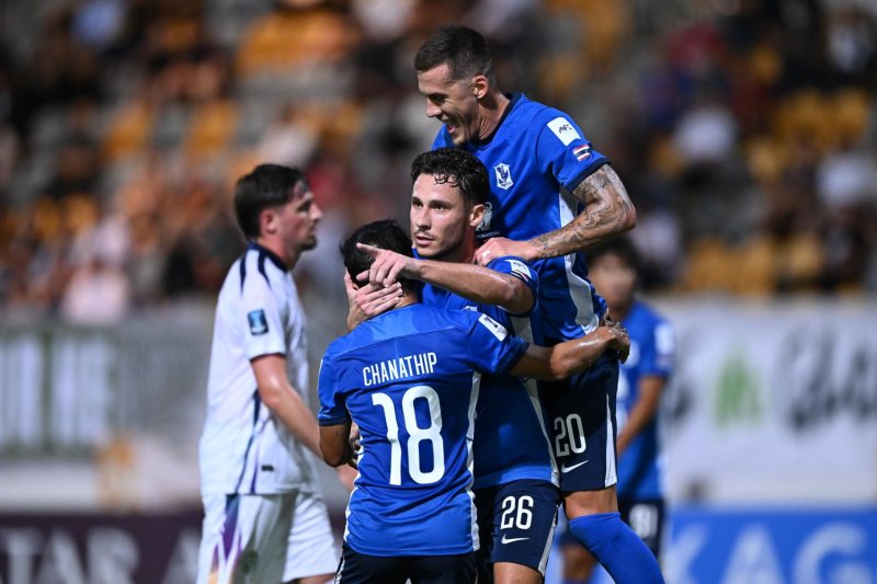 BG Pathum's Anthony Belmonte, centre, celebrates his goal with Chanathip Songkrasin and Marin Jurina. (Photo supplied)