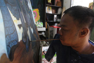 คุณเอกชัย หวันแก้ว ศิลปินแขนด้วน For Life