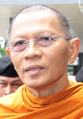 'Thieving' monks sent to jail