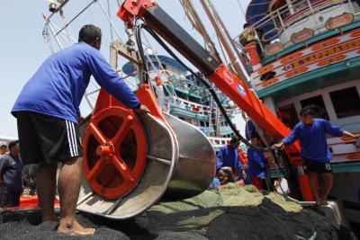 As trawlers mechanise to beat tighter fishing rules and labour shortages, fears are growing in Pattani that smaller boats could soon go out of business