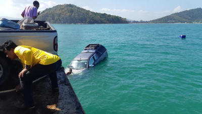 Pickup slips off boat