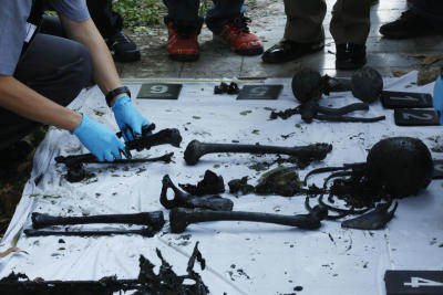 Third victim found in suspect's pond