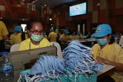 Textile firms step up mask output